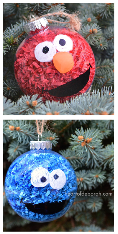 DIY Sesame Street Inspired Christmas Ornaments. This easy kid's craft makes Elmo and Cookie Monster Christmas balls to hang on your tree or give as kid made gifts! 