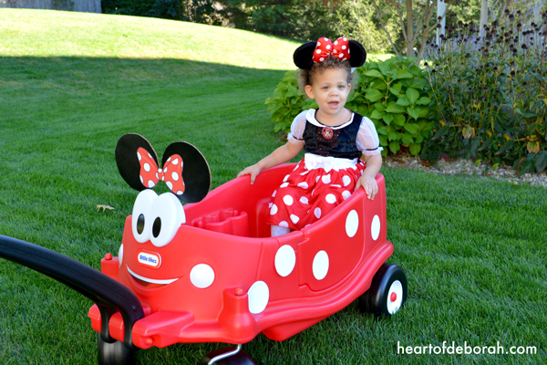 Trick or treat in style this year with a DIY Minnie Mouse Wagon to match your child's Minnie Mouse costume. This is an easy and simple DIY transformation.