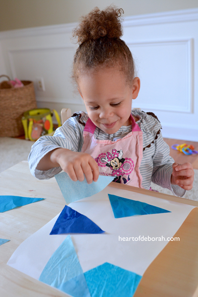 Looking for a fun spring kid's craft? Make this beautiful watercolor robin's nest spring garland with your children! They will love this kid's activity.