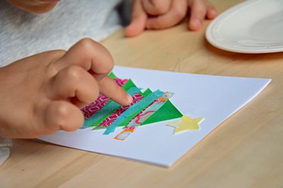 I love this adorable kid's craft! Make your own greeting cards with holiday season with this easy kid made Christmas card.