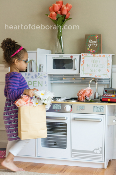 How cute is this flower shop?! I love how they used their pretend play kitchen as a space for selling flowers as well.