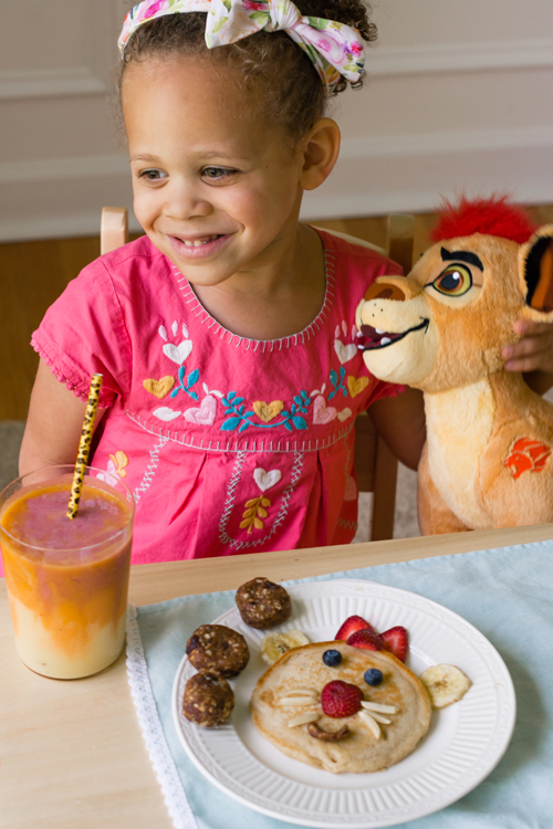 Encourage healthy eating and have a blast with these Disney Junior fun breakfast ideas! Your kids will love joining the Lion Guard characters while eating their lion cub pancakes and pride rock energy balls while sipping their sunrise smoothie. Healthy snacks and a fun summer idea.