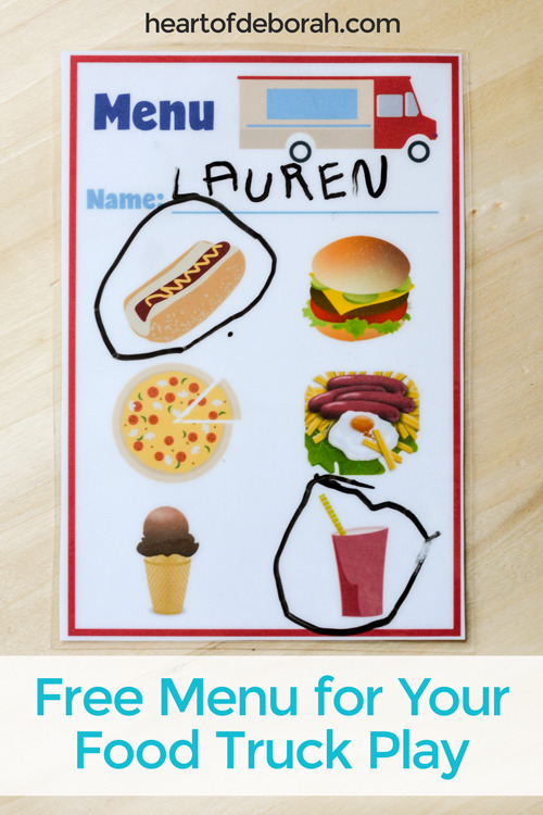 Awesome pretend play center for preschoolers! Build your own play food truck. Free menu and open sign printable to download! Your kids will love taking orders and ringing the bell when it's ready.