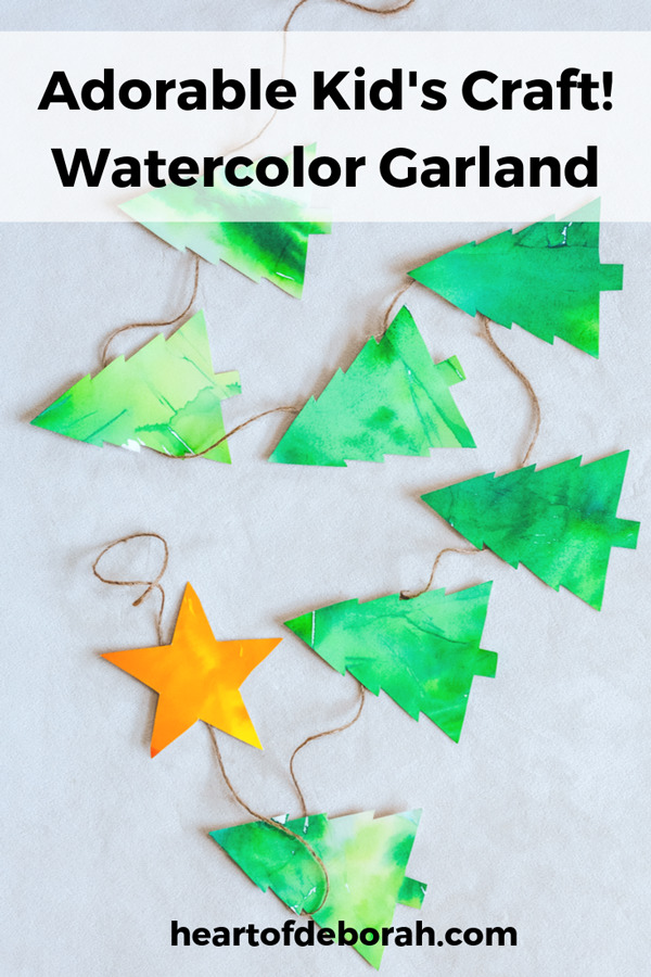 How cute is this Christmas tree craft? Make a watercolor garland with your kids.