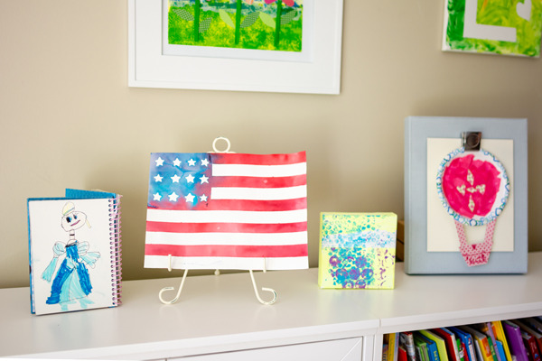 Looking for unique ways to display your children's art? Here are 7 beautiful ways to display kid's art in your house. Your kids will love seeing their work.