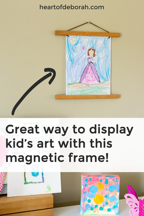 Looking for a reusable frame to display your kid's art? Switch out their kid's crafts easily with this magnetic frame. So easy to use and it looks great displayed! #homedecor #kidsart #frame #forthehome