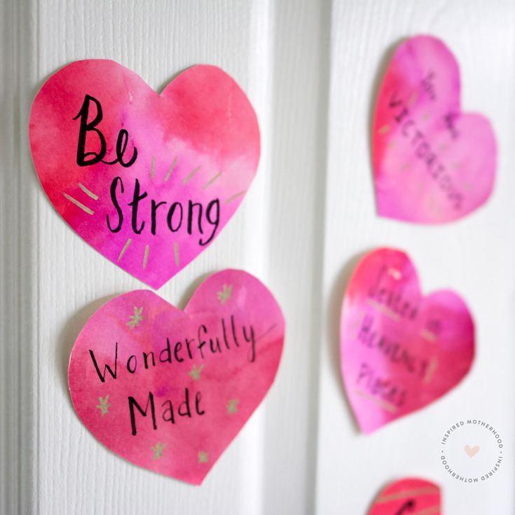 Do you want to speak live over your child? Try using these 14 Christian positive affirmations to shower your kids with love. You can craft the watercolor hearts yourself or download the free printable with biblical positive affirmations.