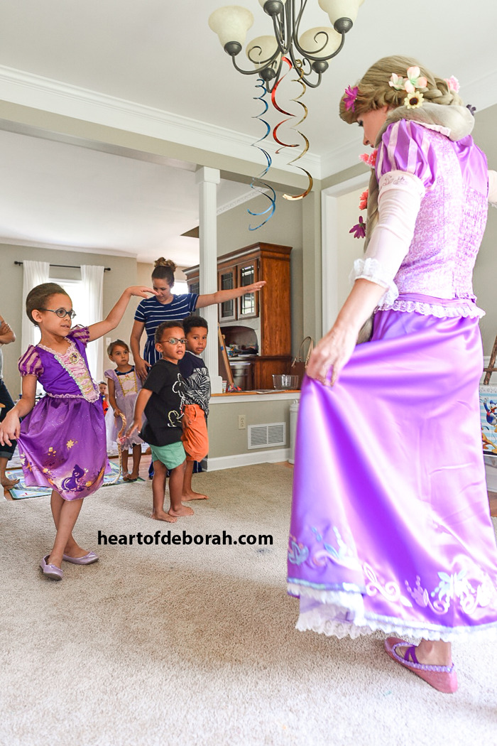 Rapunzel giving us twirling lessons at the birthday party.